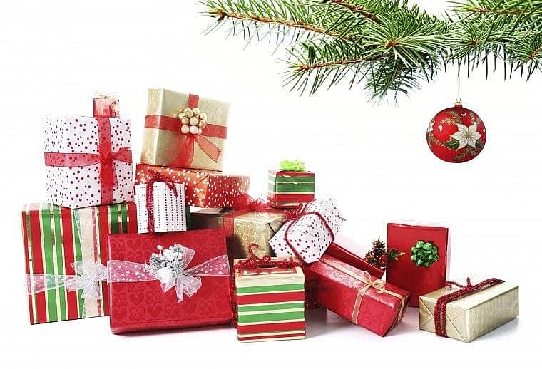 Image of wrapped gifts under a christmas tree.