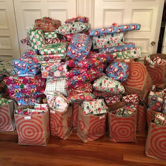Photo of large pile of wrapped gifts.
